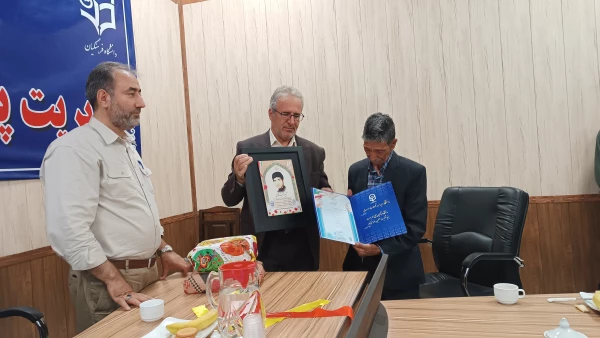 مراسم تجلیل از خانواده شهید همت فتاحی و تجلیل از اساتید و کارمندان شاهد و ایثارگر  13